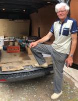 Dennis Duggan Loading the books